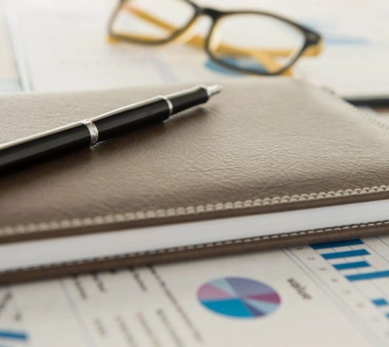 Small-business owners reviewing their books
